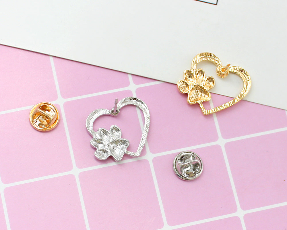 Caring dog paw cutout brooch